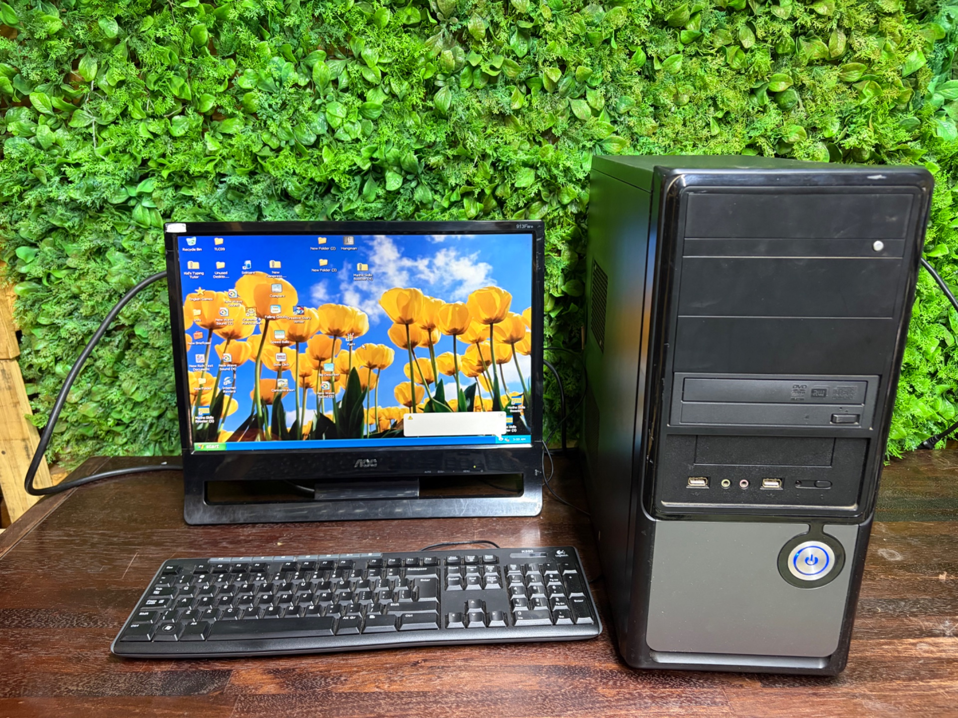 Used Desktop PC with AOC Monitor, Keyboard & Cables – Powers on and boots to desktop