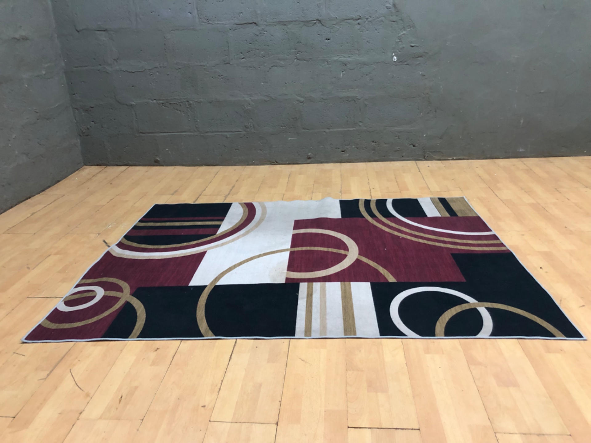 Modern geometric low‑pile area rug — burgundy, black & cream, 200 x 151 cm