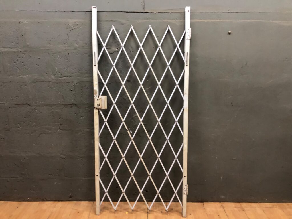 Collapsible metal security gate — 201 cm H x 90 cm W, lock tested, brackets included