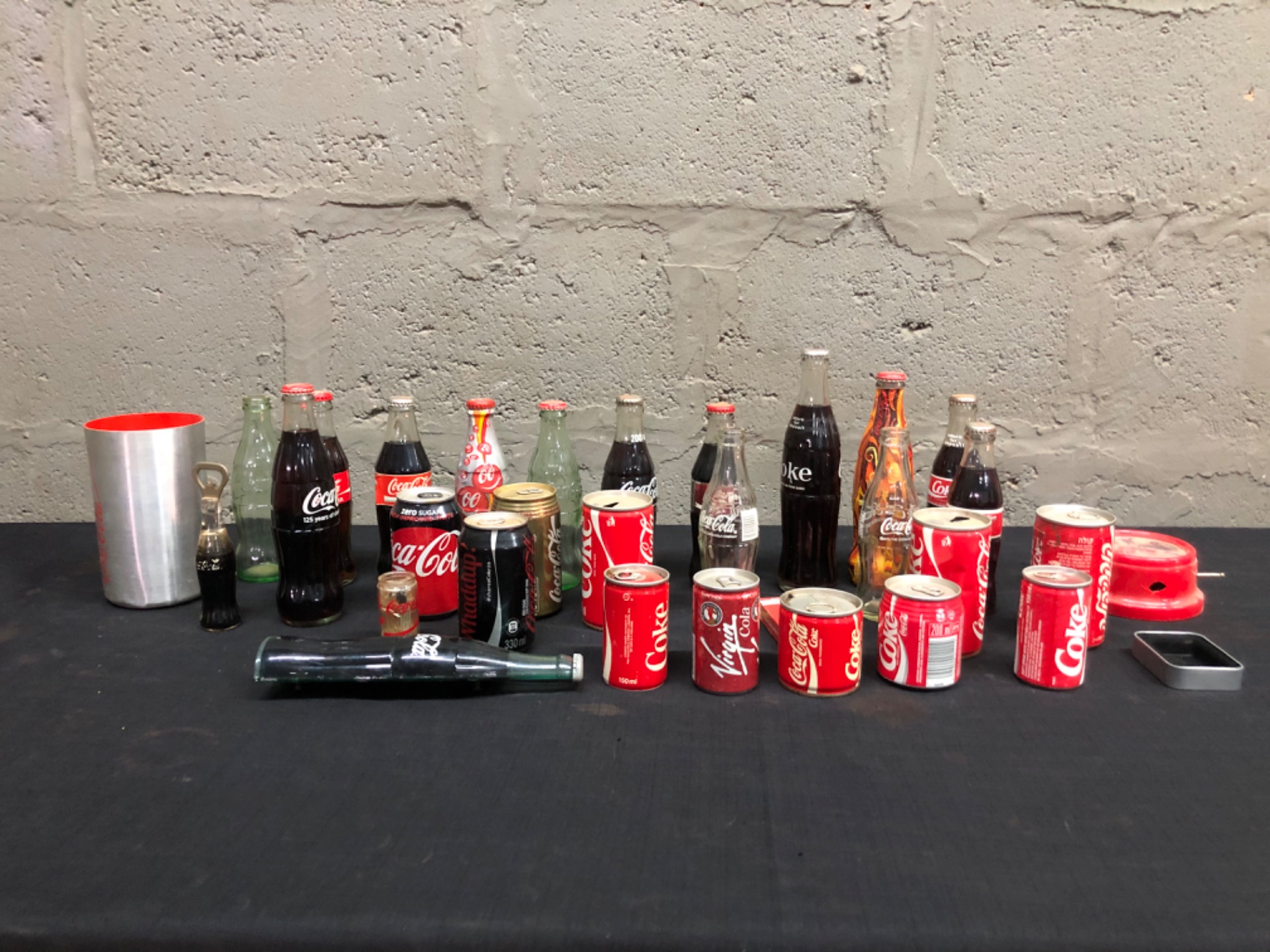 Mixed Coca‑Cola Memorabilia Lot – Assorted Bottles, Cans, Tins, Branded Alarm Clock & Accessories (approx. 30 pieces)