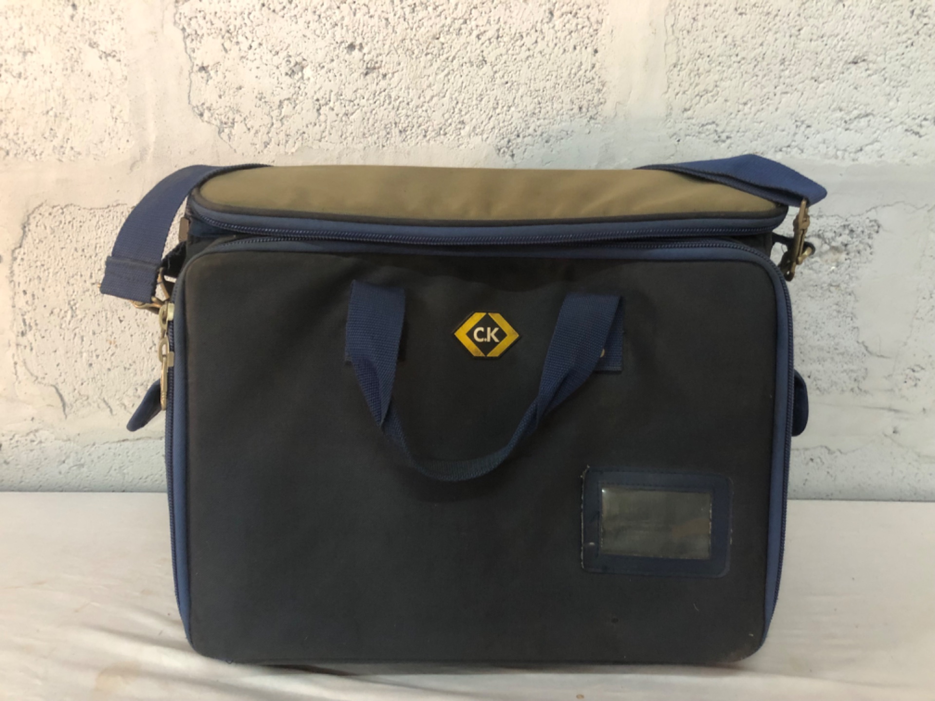 C.K soft-sided tool organiser / shoulder bag — padded main, front organiser pockets (used)