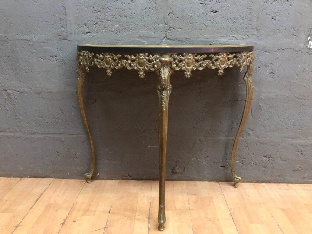Gilt ormolu-style demilune console table — ornate frieze, original top (79 x 44 x 88 cm)