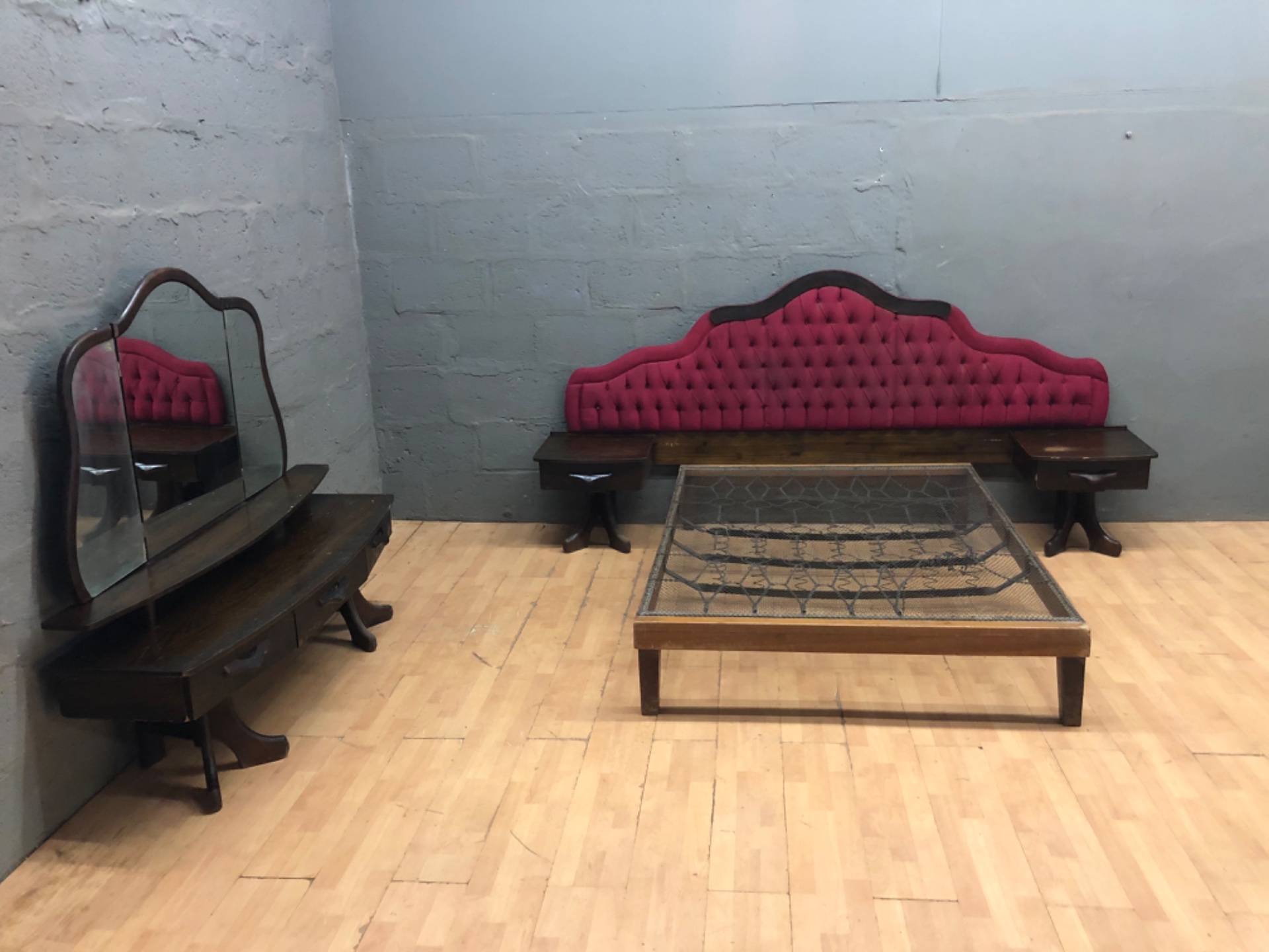 Vintage tufted upholstered double bed suite with metal spring base, attached bedside tables and tri-fold mirror dressing table