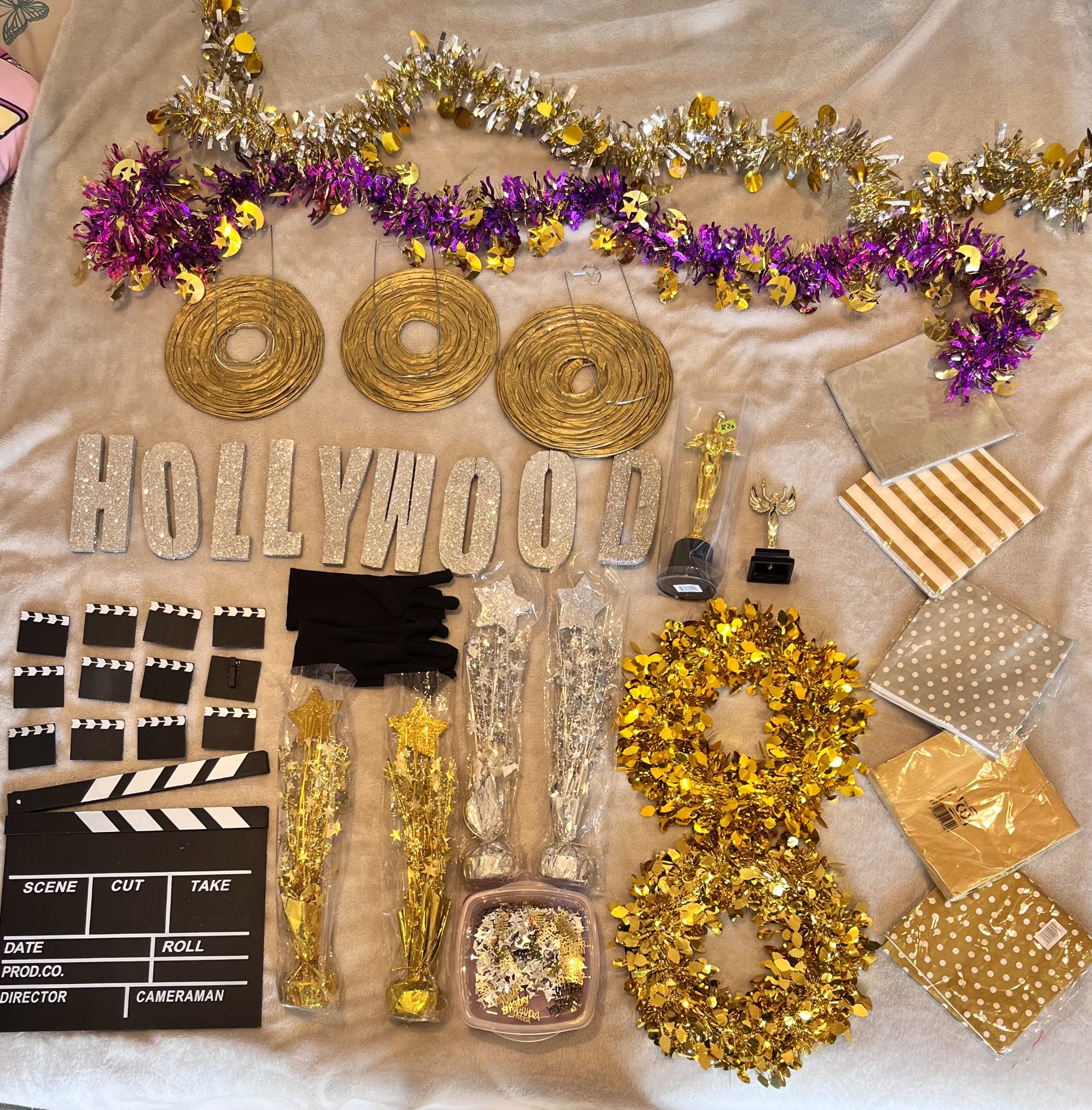 Mixed Hollywood-themed party & photo-prop lot — glitter letters, gold/silver garlands, trophies, napkins, confetti & more