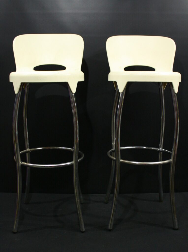 Pair of white plastic-seat chrome bar stools — approx 1m legs, used condition