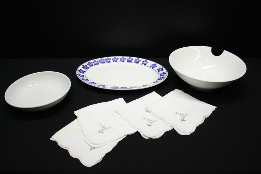 Mixed ceramic serving lot — Continental Vitrified Hotelware oval platter, two white serving bowls & embroidered napkins
