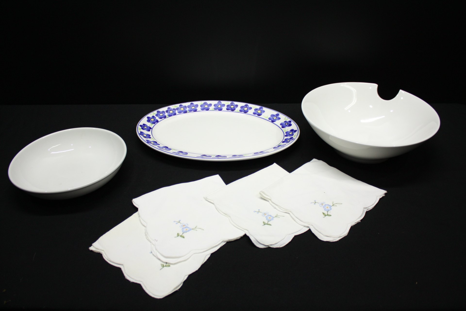 Mixed ceramic serving lot — Continental Vitrified Hotelware oval platter, two white serving bowls & embroidered napkins