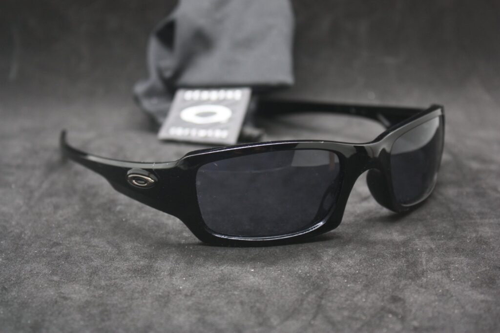 Oakley Original ‘FIVE’ sunglasses — seller claims Oakley FIVE, soft pouch included, used with scratches