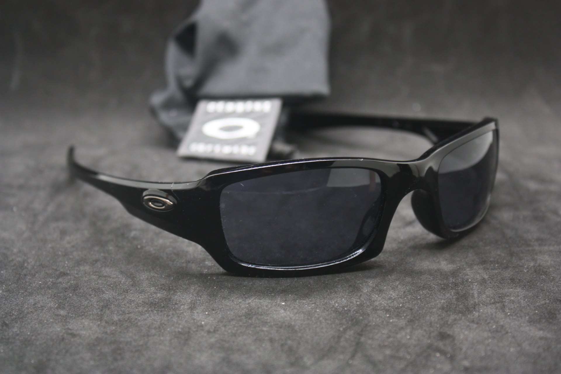 Oakley Original ‘FIVE’ sunglasses — seller claims Oakley FIVE, soft pouch included, used with scratches