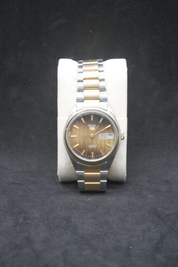 Seiko 5 two-tone wristwatch (quartz) — day/date, worn, untested, sold as-is