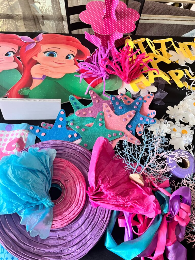 Ariel / Little Mermaid themed children’s party decorations lot — approx. 30 mixed pieces (used, visible wear)