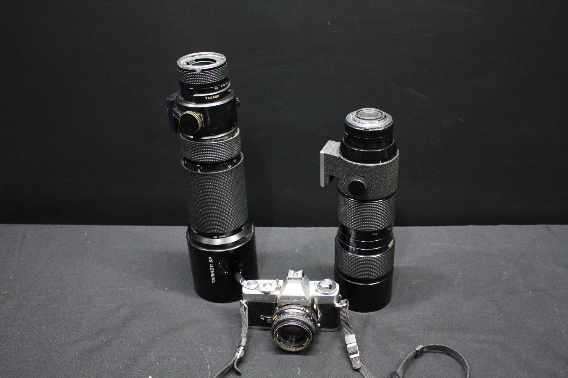 Minolta XD5 film SLR with Minolta MD Rokkor 45mm + Tamron SP and Vivitar 120-600mm telephoto lenses (Untested, heavy wear)