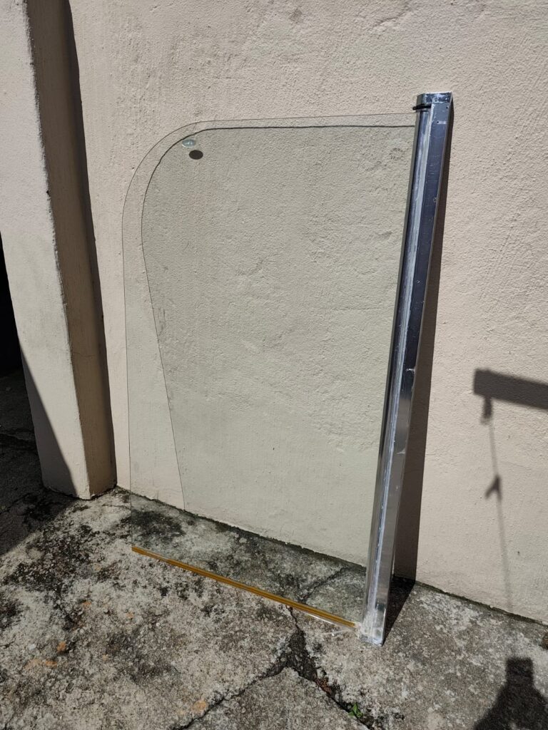 Curved tempered Salvatore glass shower/screen panel – drilled fixing hole (used)