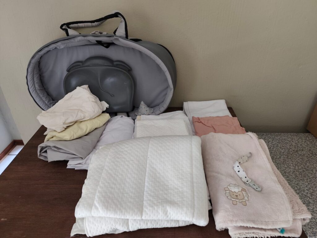 Mixed baby bedding bundle with grey carrycot insert, quilted pads, sheets & embroidered towel