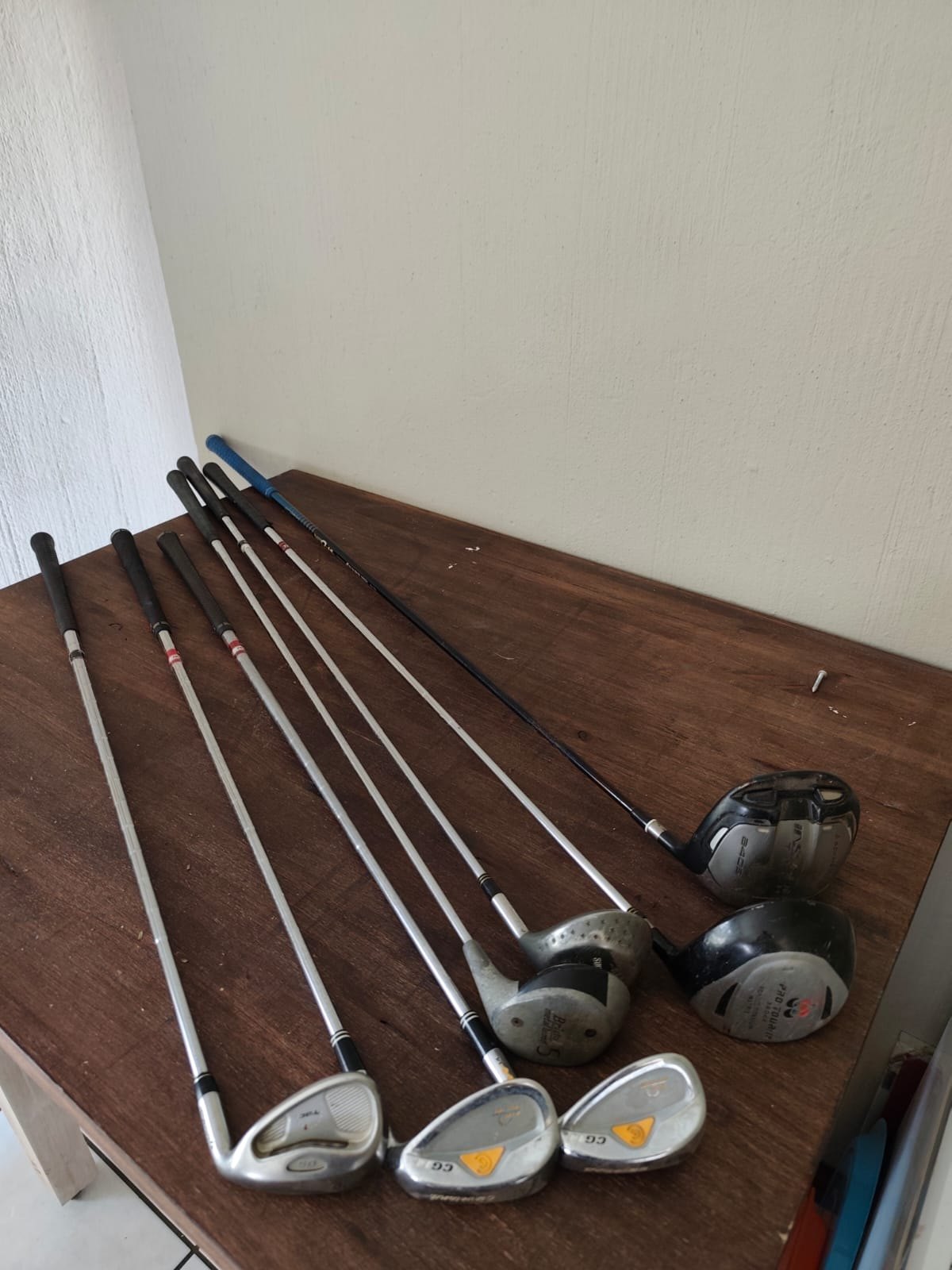 Mixed golf clubs with blue Proline carry bag — Cleveland & Adams heads, heavily used (spares/repair)