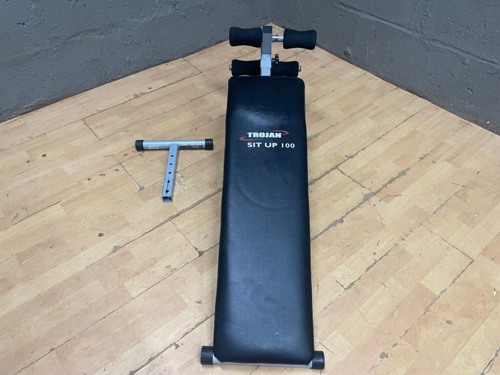 Trojan SIT UP 100 flat sit-up / abdominal bench — padded bench with foam rollers, front T-piece detached