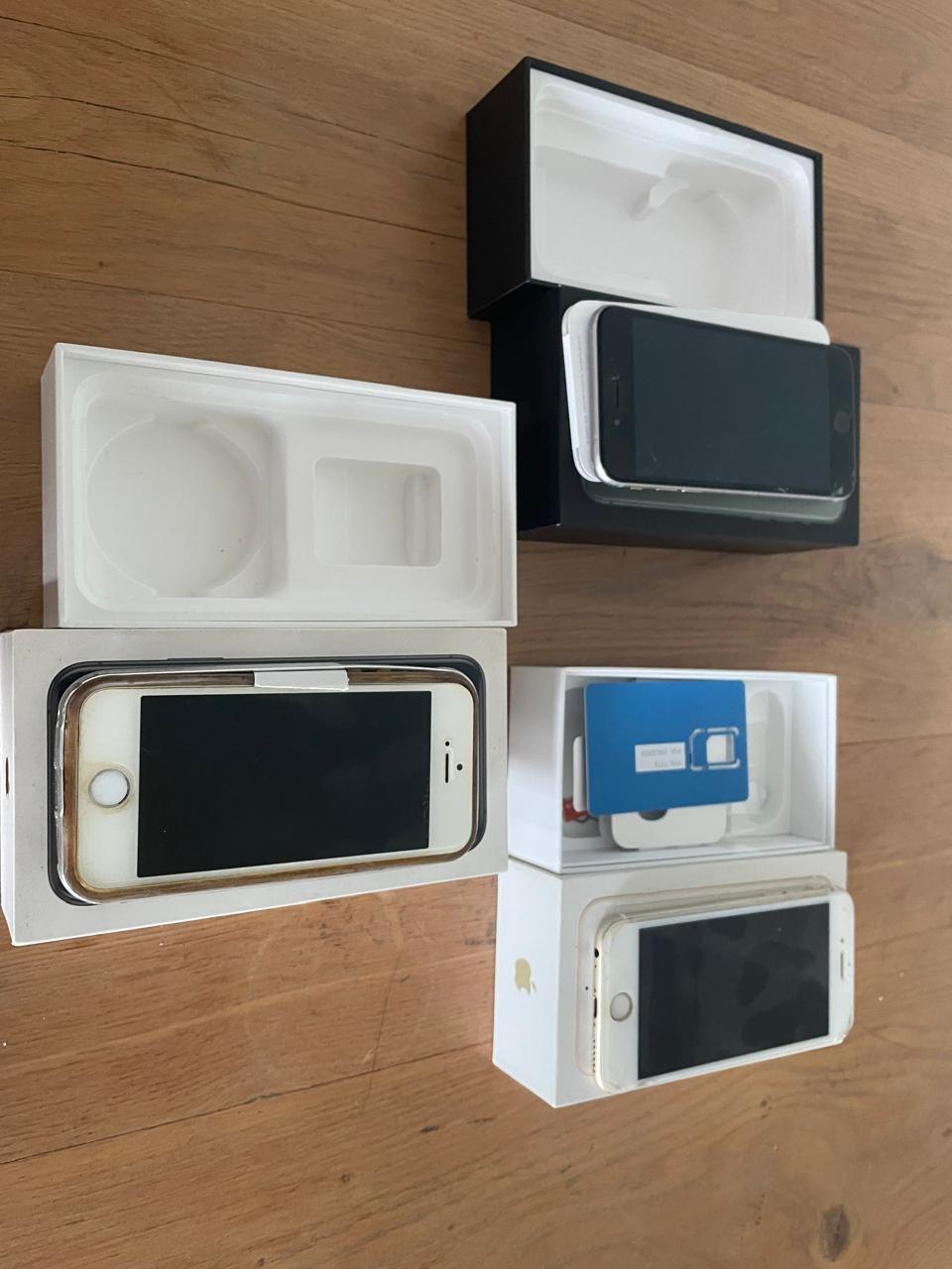 Lot of 3 Apple iPhones (older models) — boxed, cracked screens, untested / activation locked