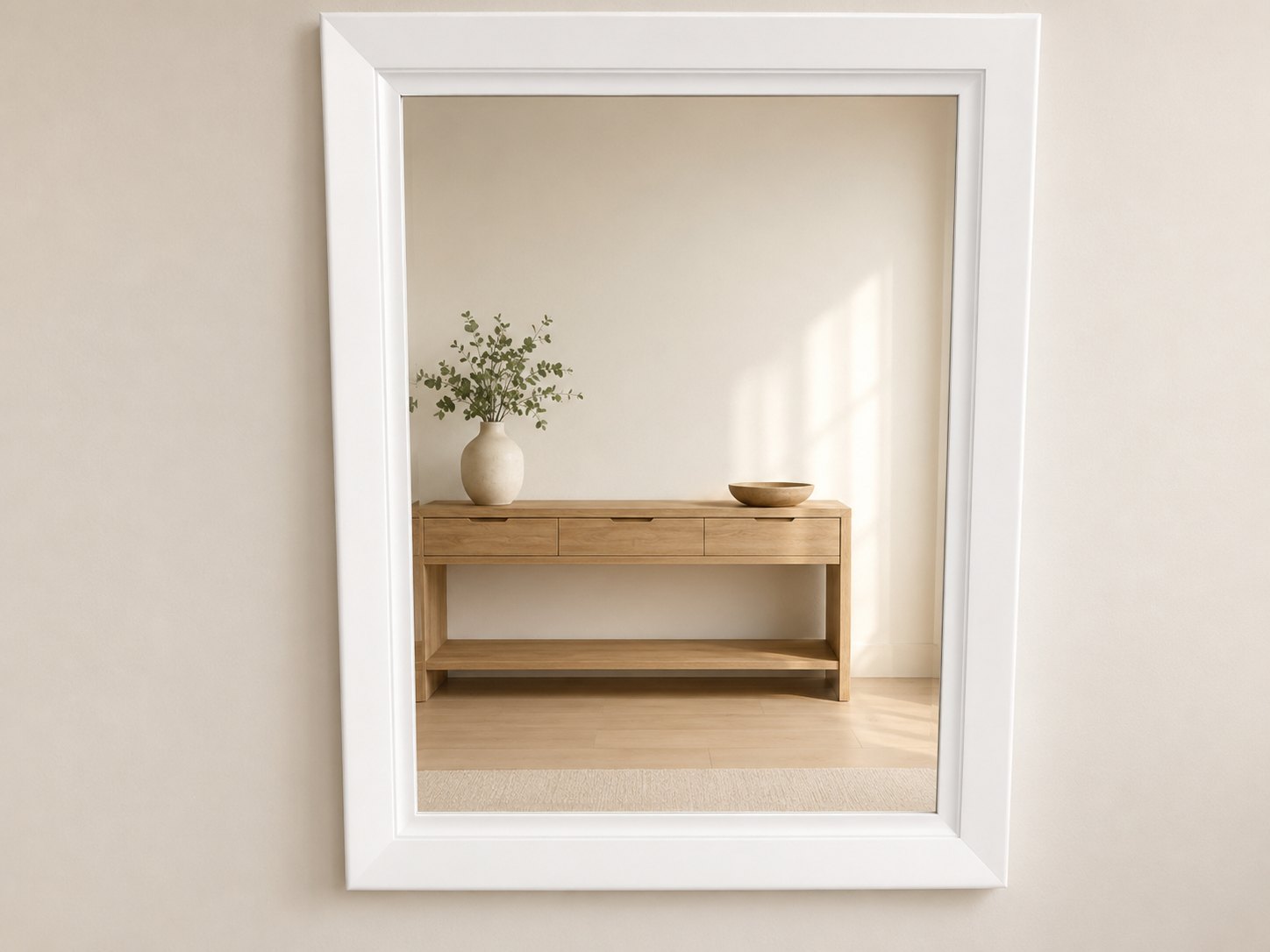Large white framed wall mirror with intact glass and secure hanger (110 x 90 x 4 cm)