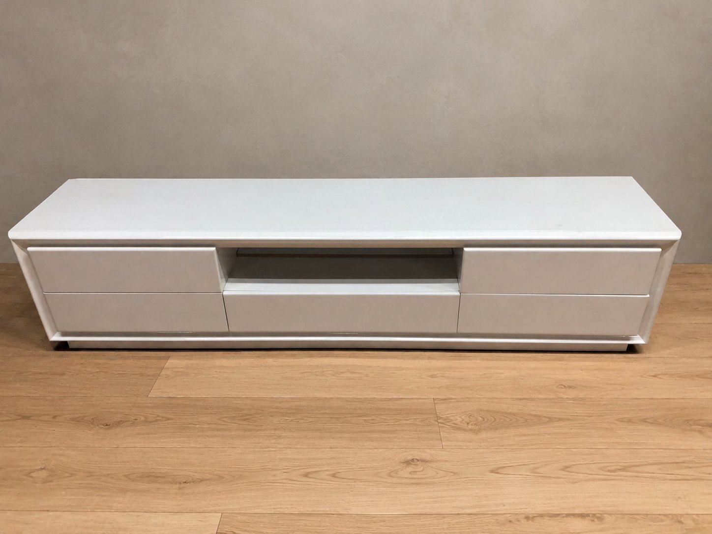 White gloss low TV / media cabinet — 6 drawers, central open shelf, 240 × 50 × 50 cm