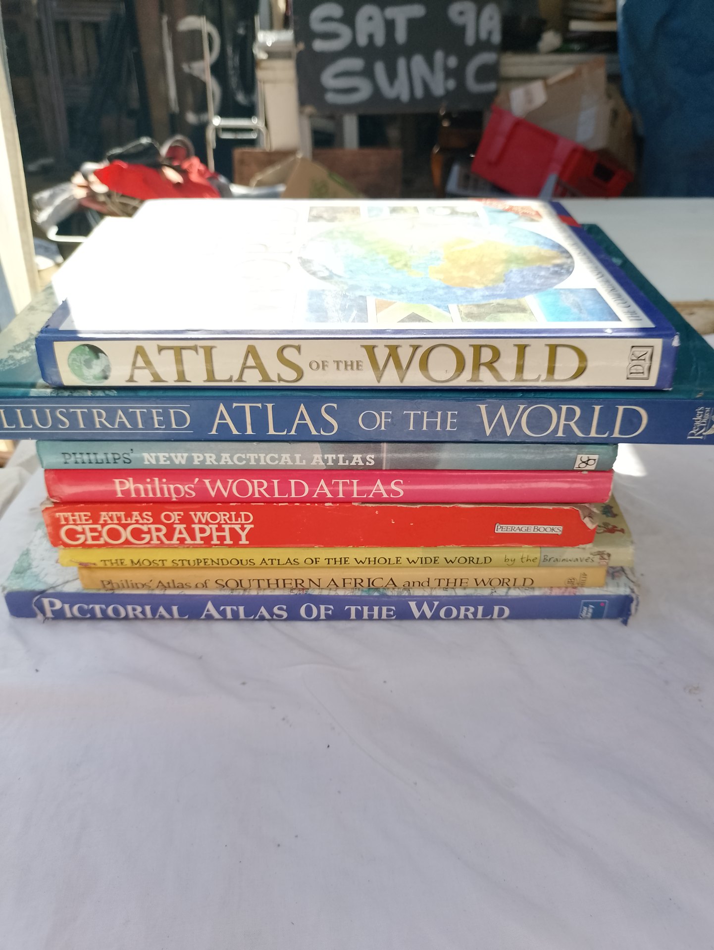 Lot of 8 Assorted Hardcover World Atlases (DK, Reader’s Digest, Philips) – Fair Condition