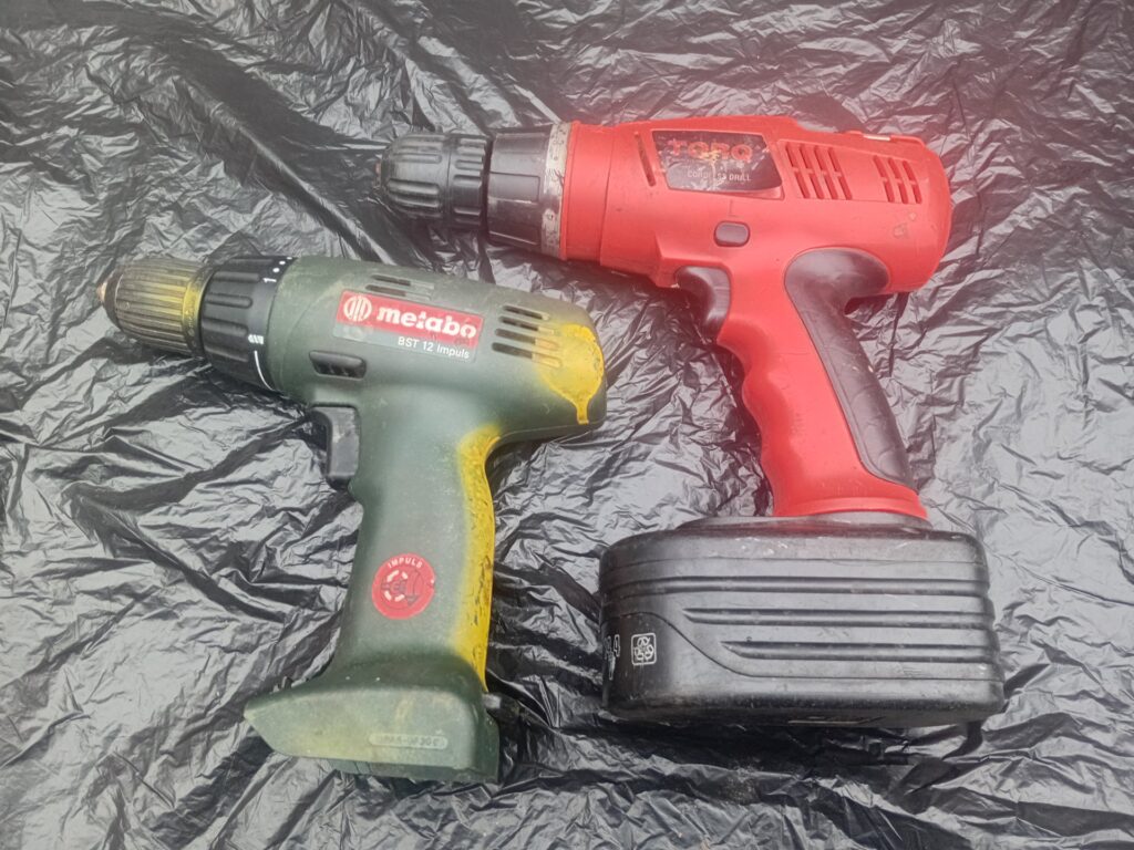 Lot of 2 Cordless Drills — Metabo BST 12 Impuls (green) + red Torq drill (Untested, heavy wear)