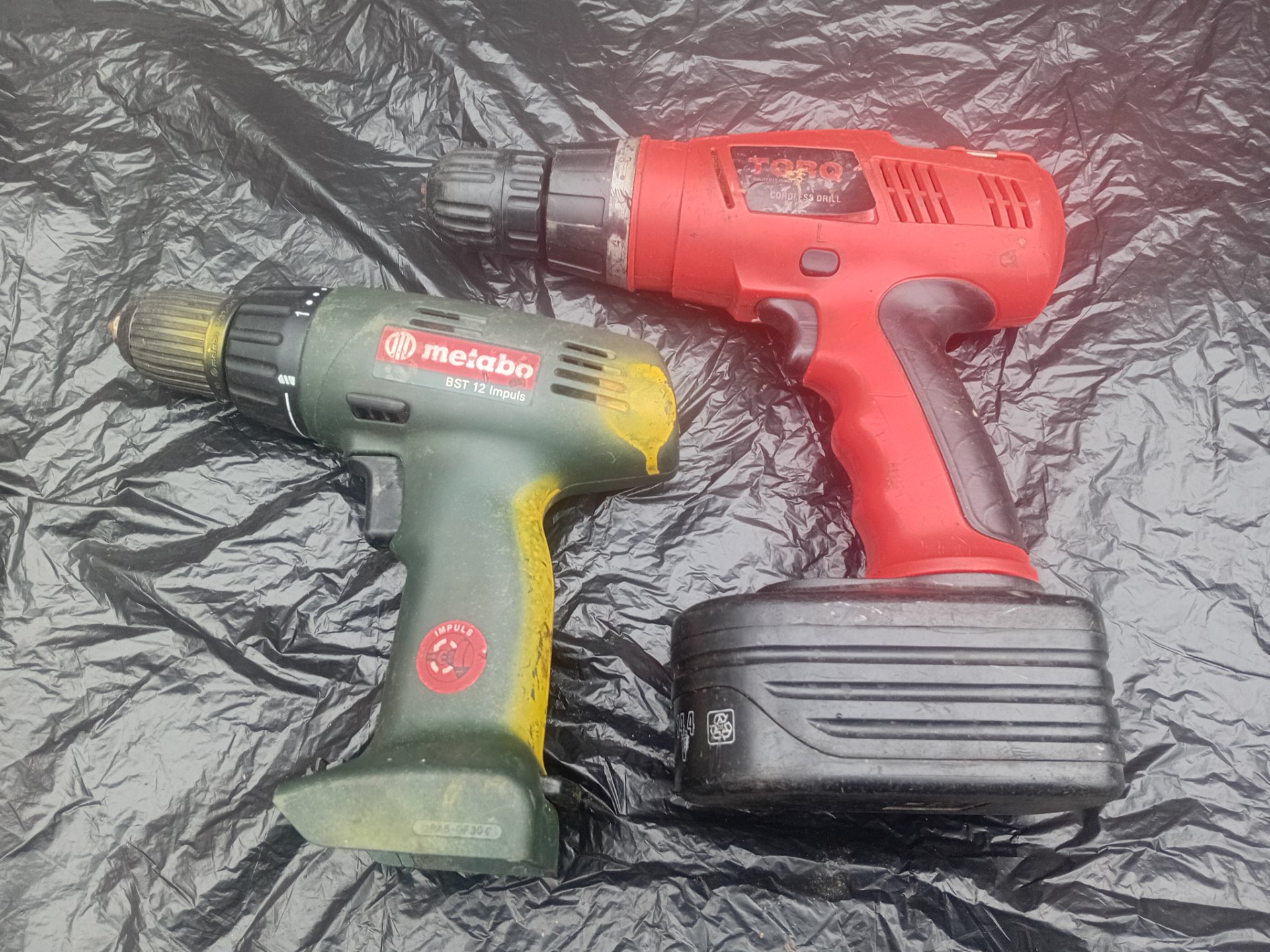 Lot of 2 Cordless Drills — Metabo BST 12 Impuls (green) + red Torq drill (Untested, heavy wear)