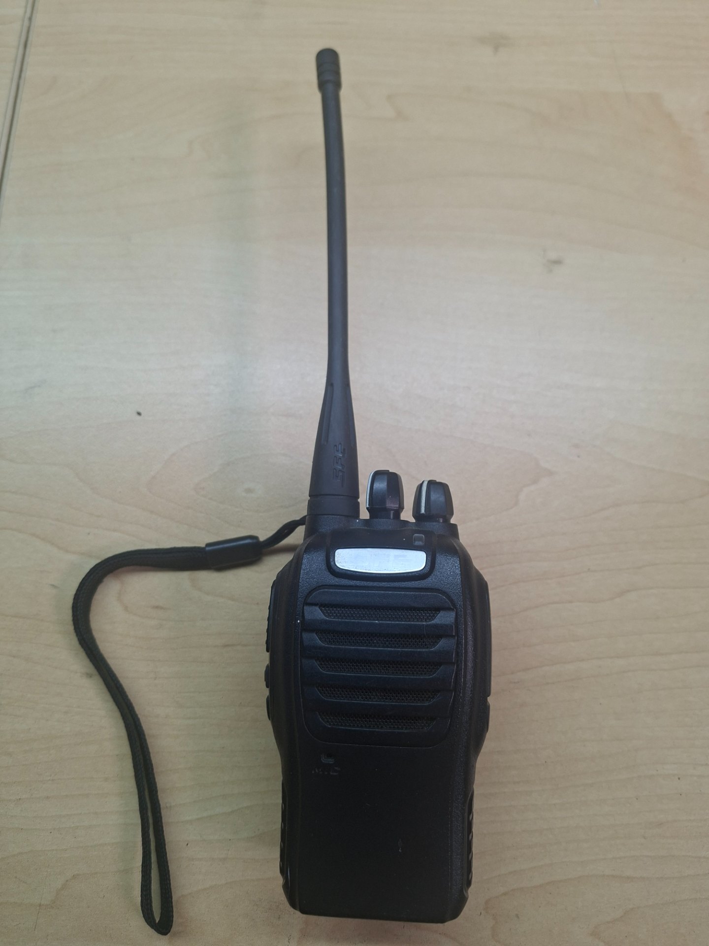 SFE handheld two-way radio / walkie-talkie — seller-tested working, battery included, belt clip, antenna (~21cm)