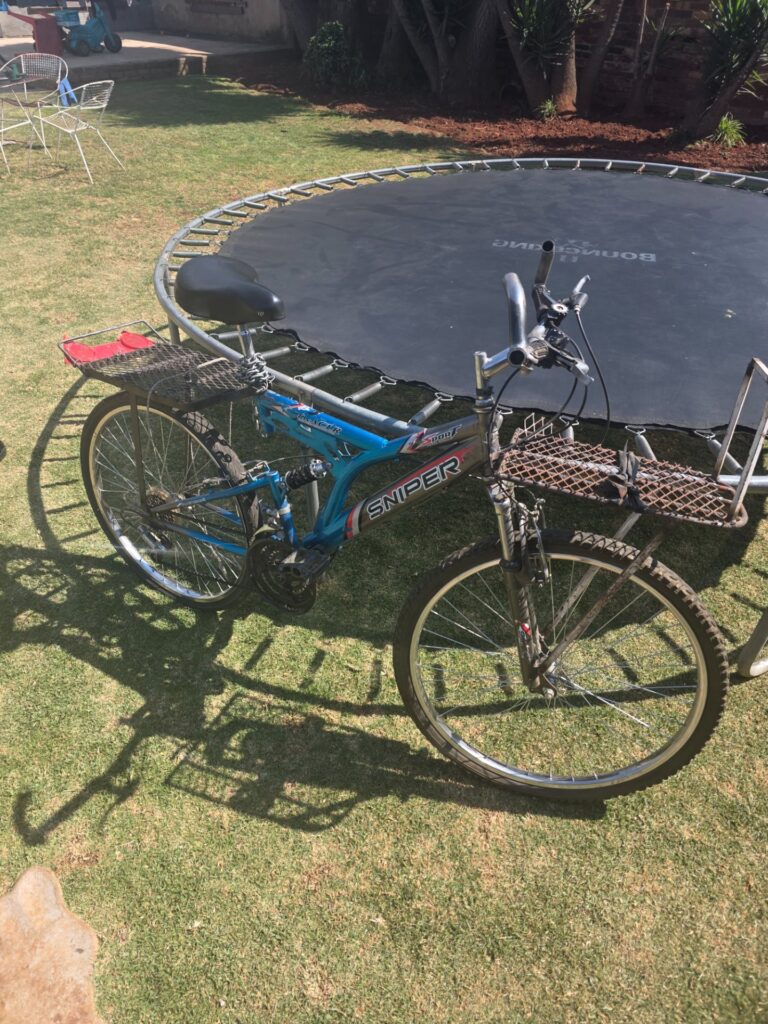 Sniper mountain-style bicycle with heavy front & rear metal racks — used, working with faults