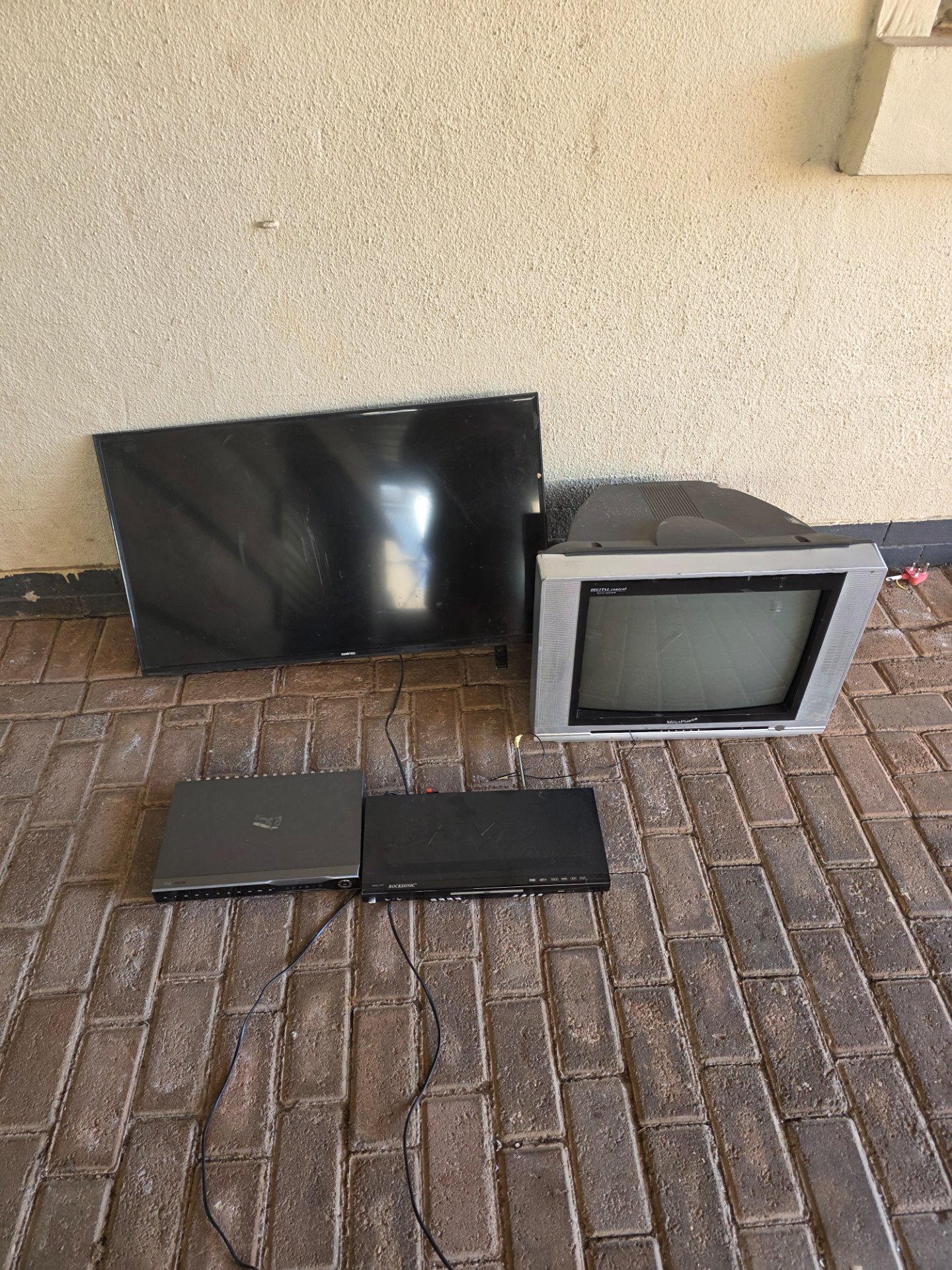 Mixed electronics lot: Sinotec LED TV, MegaPower CRT TV, Rocksonic DVD-777 & AND-VISION DVR — Sold as-is, not working