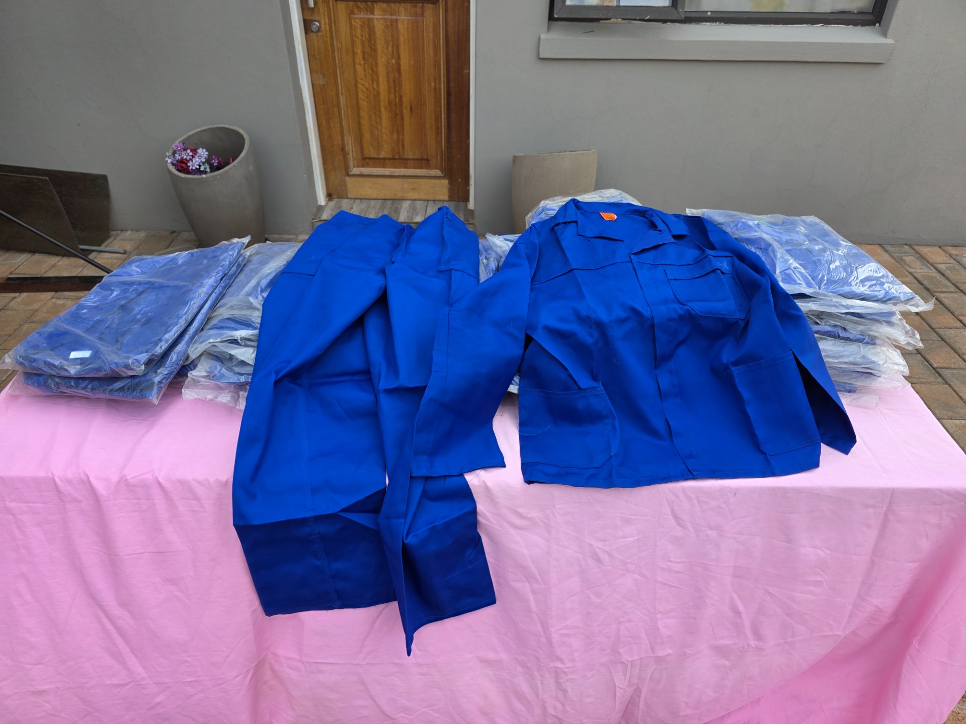 Lot of 35 Brand New Blue Work Overalls — Mixed Sizes, Mostly Individually Packaged