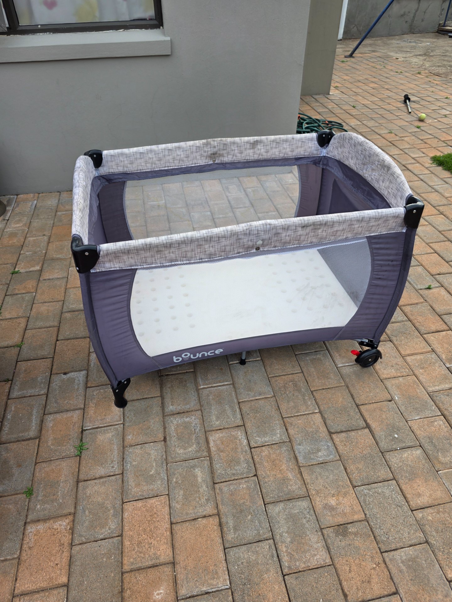 Bounce baby playpen / travel cot with original mattress — used, mesh sides intact