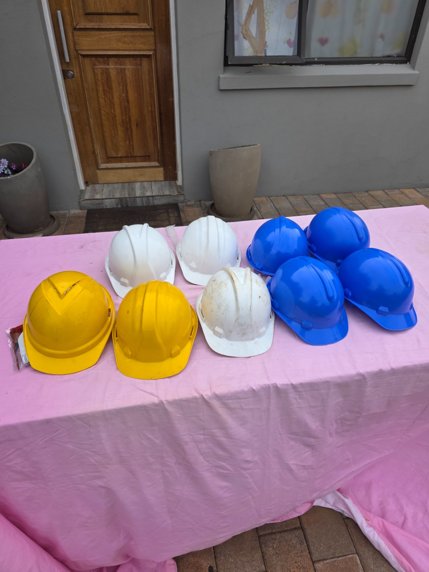 Lot of 9 Assorted Construction Hard Hats — Yellow, White & Blue, Used, Suspensions Intact