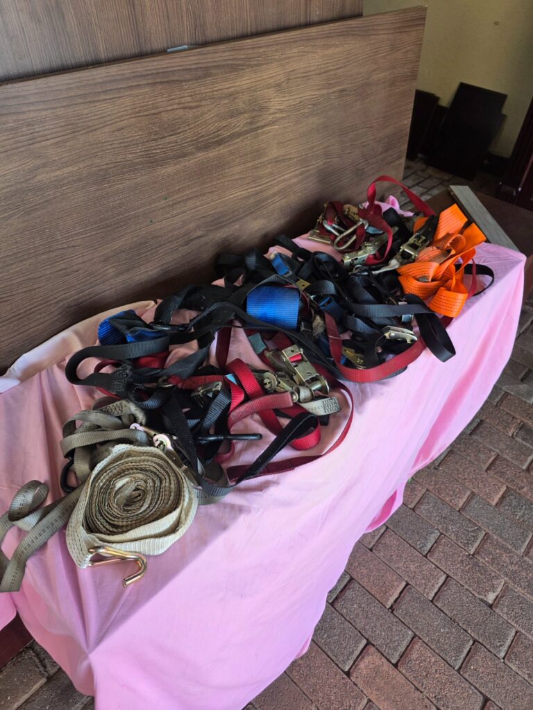 Assorted used ratchet / tie-down straps – mixed condition, hooks & ratchets included