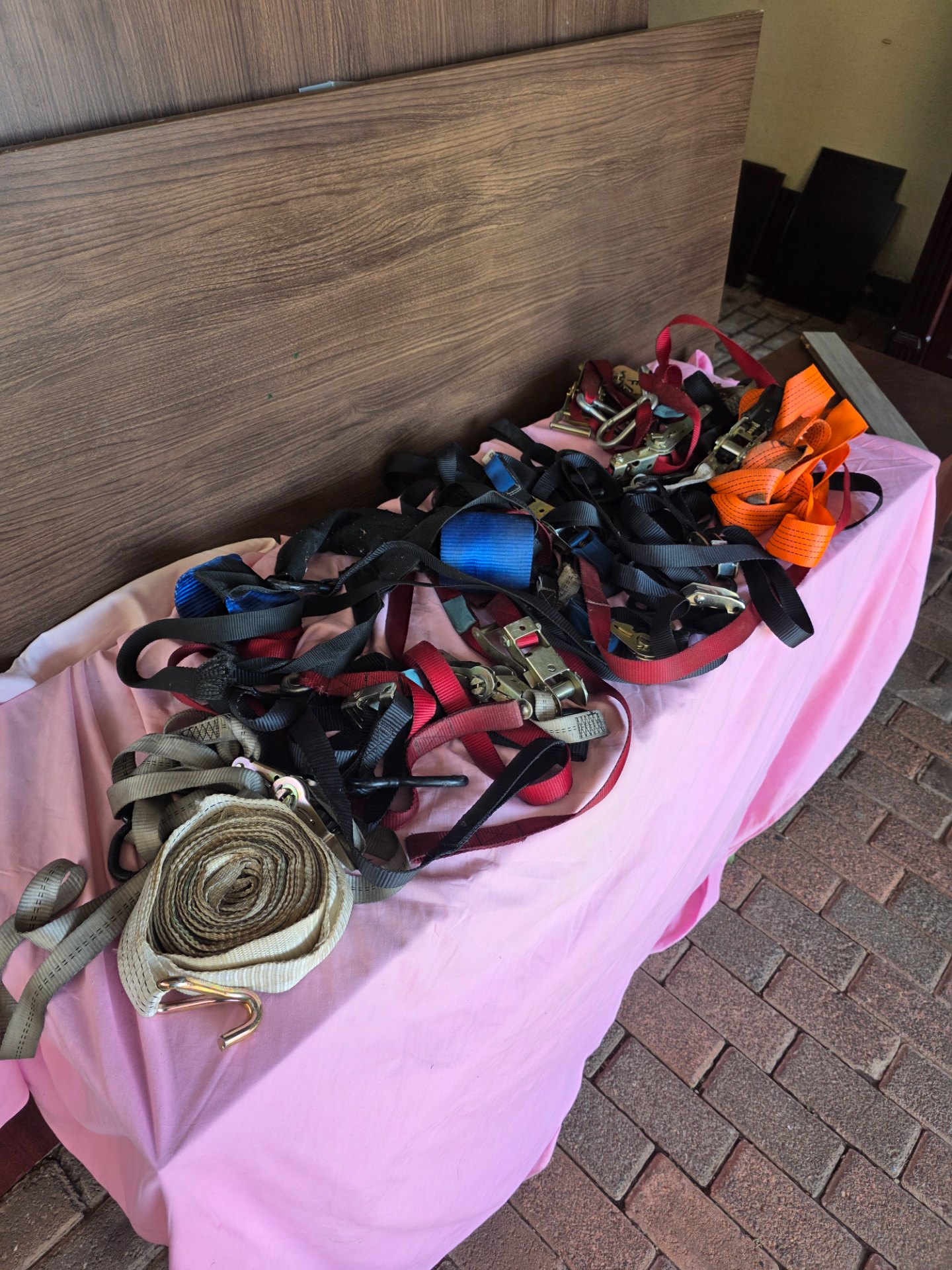 Assorted used ratchet / tie-down straps – mixed condition, hooks & ratchets included