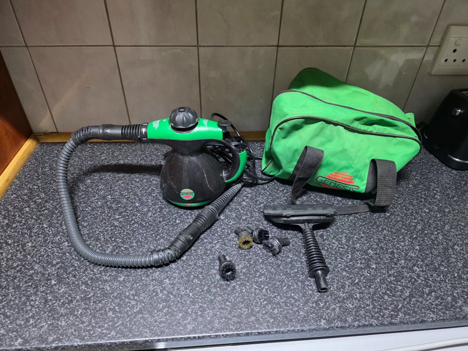 Genesis compact handheld steam cleaner with hose, wand, floor head, brushes & carry bag — tested working