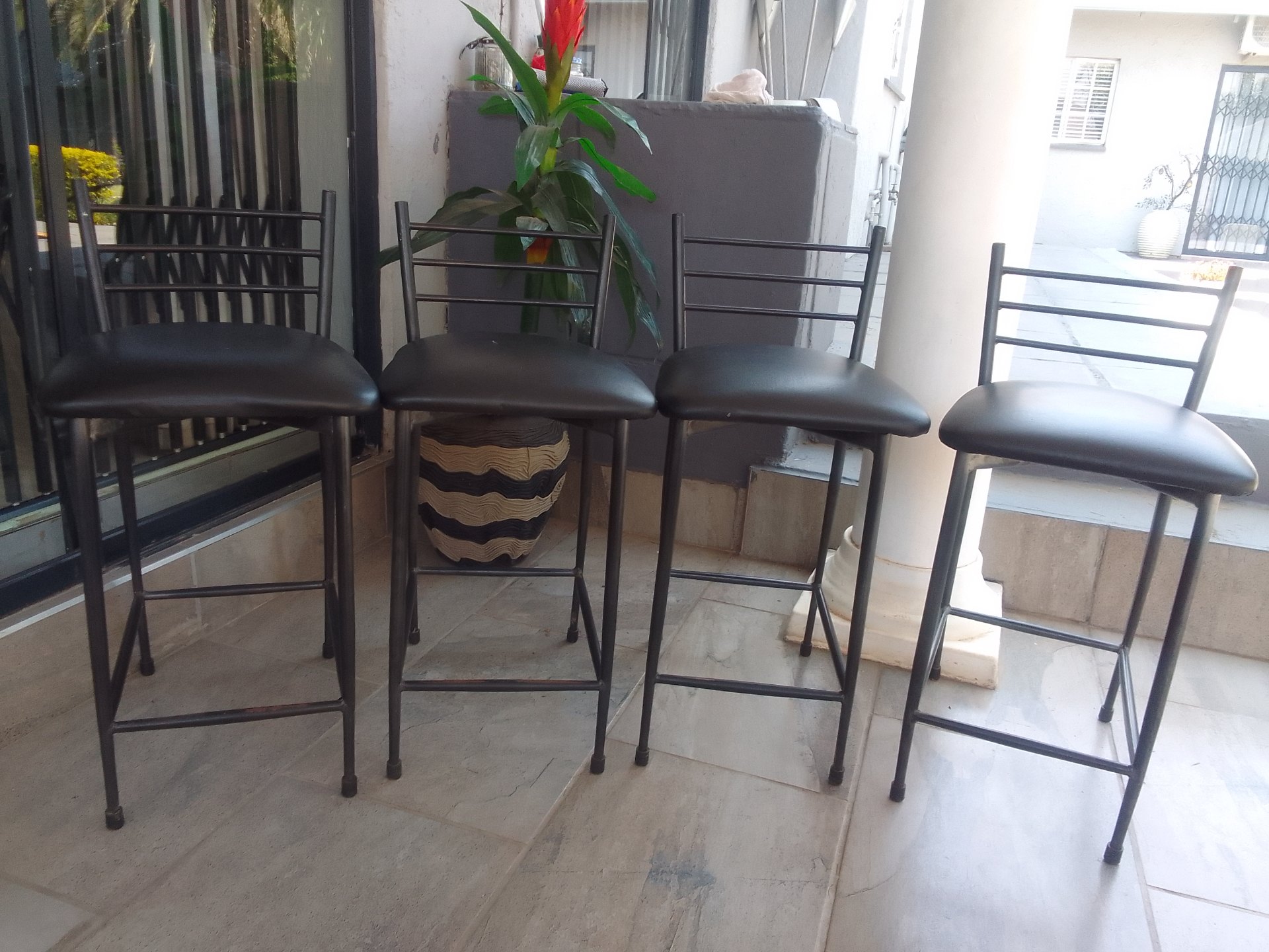 Set of 4 Black Metal Bar / Counter Stools — Padded Vinyl Seats, Used