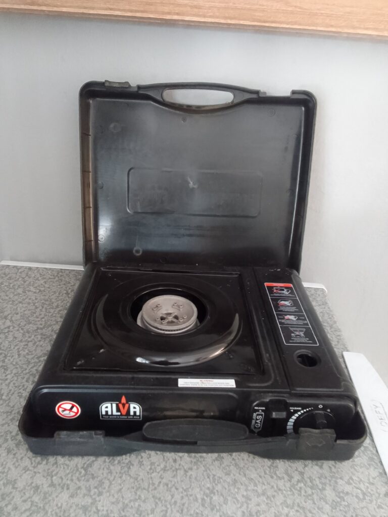 ALVA portable single-burner butane stove in plastic carry case — working 100%