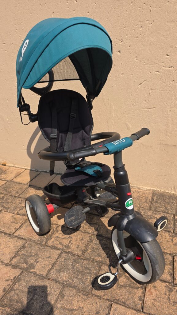 Q Play 3-wheel children’s push trike / stroller with canopy, harness & folding push-handle — used, cosmetic wear