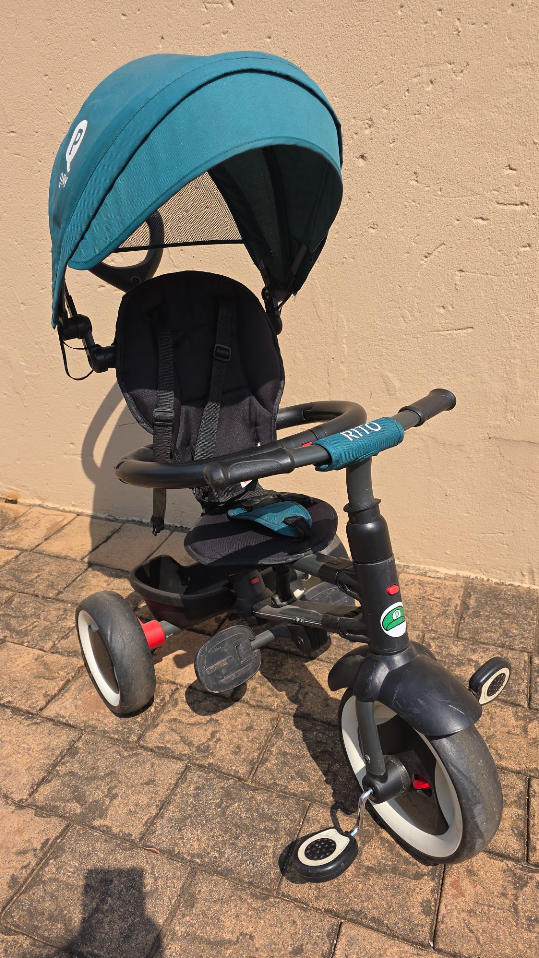 Q Play 3-wheel children’s push trike / stroller with canopy, harness & folding push-handle — used, cosmetic wear