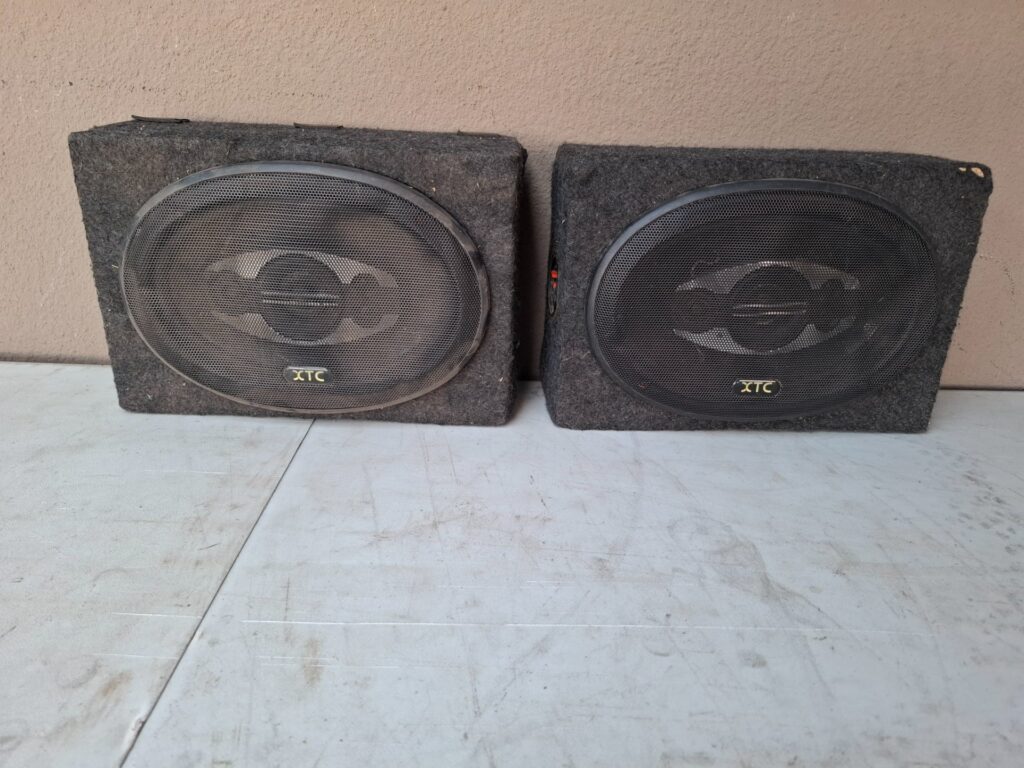 Pair of XTC-branded Carpeted Car Subwoofer Enclosures with Grills & Push‑fit Terminals — Untested