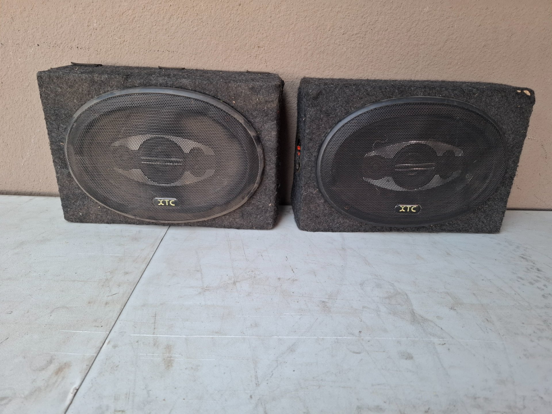 Pair of XTC-branded Carpeted Car Subwoofer Enclosures with Grills & Push‑fit Terminals — Untested