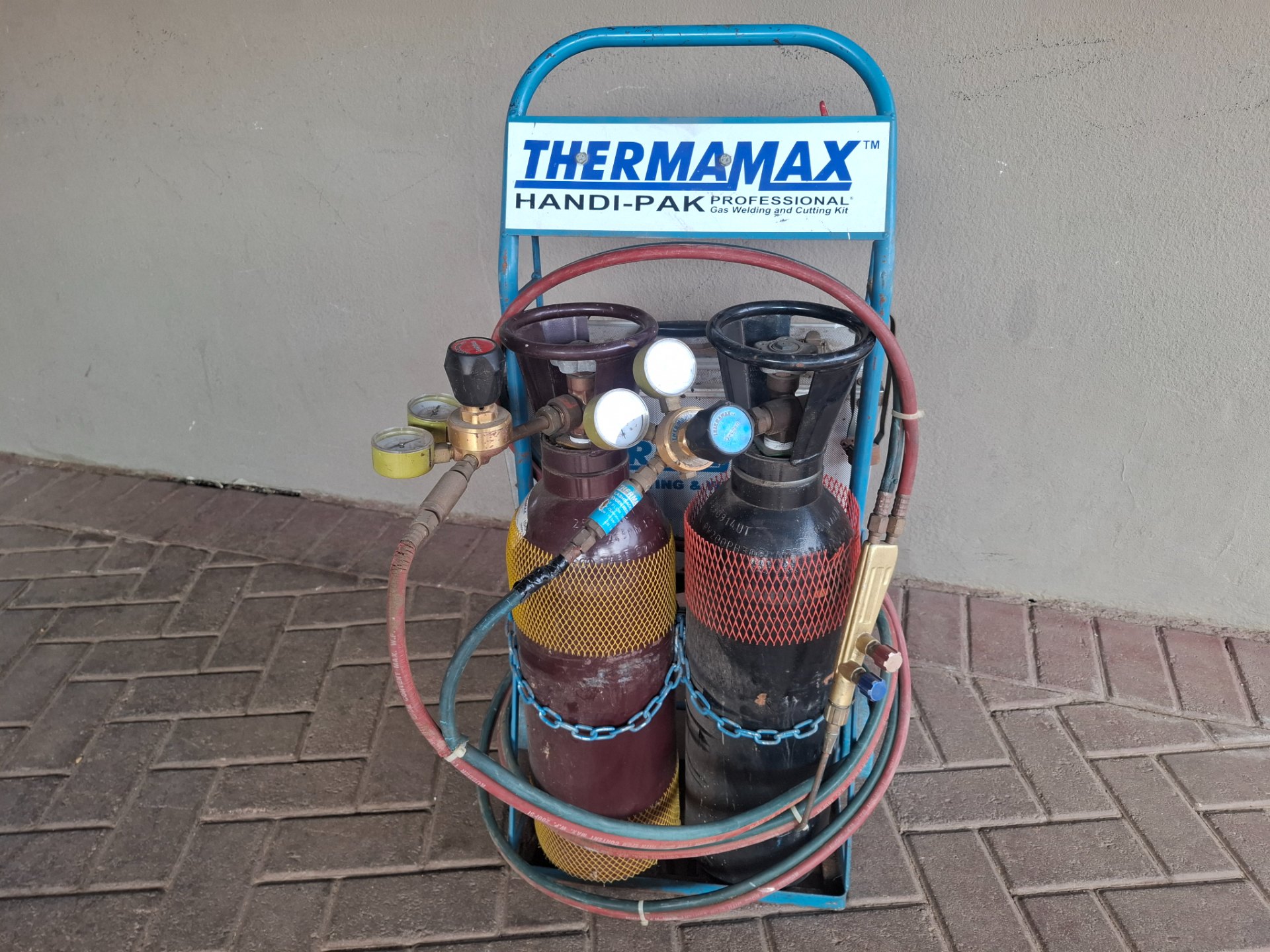 Thermamax Handi-Pak portable oxy-acetylene welding & cutting kit on trolley — 2 small cylinders, regulators, hoses, torch + accessory case