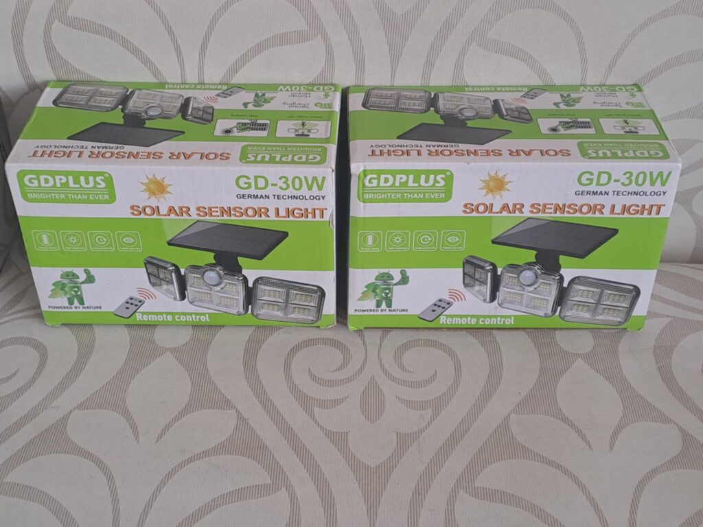 Pair of GDPLUS GD-30W Solar Sensor Lights — 2 x New Sealed Units with Remote & Mounting Kit