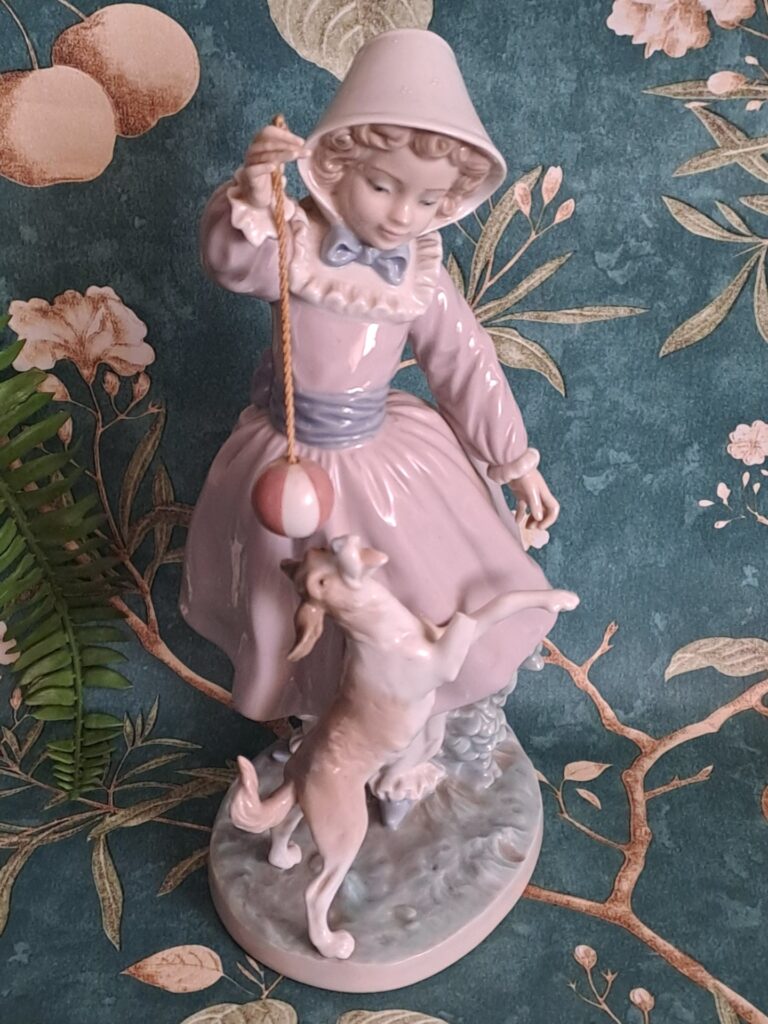 LLADRÓ porcelain girl with dog (factory stamp DAISA 1979) — pastel glazed figurine, damaged dog leg