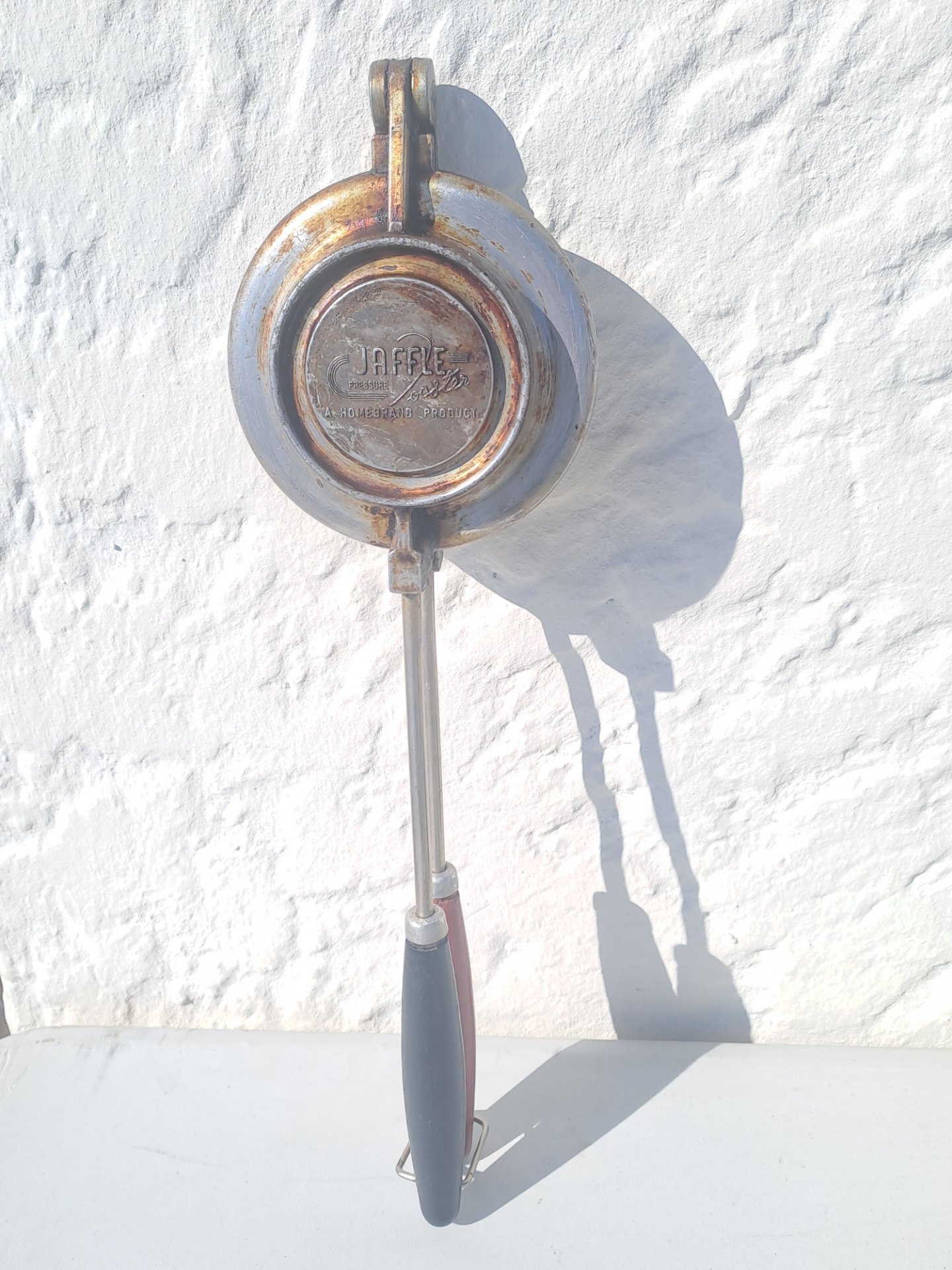 Vintage stovetop JAFFLE toaster — hinged sandwich press with long insulated handle