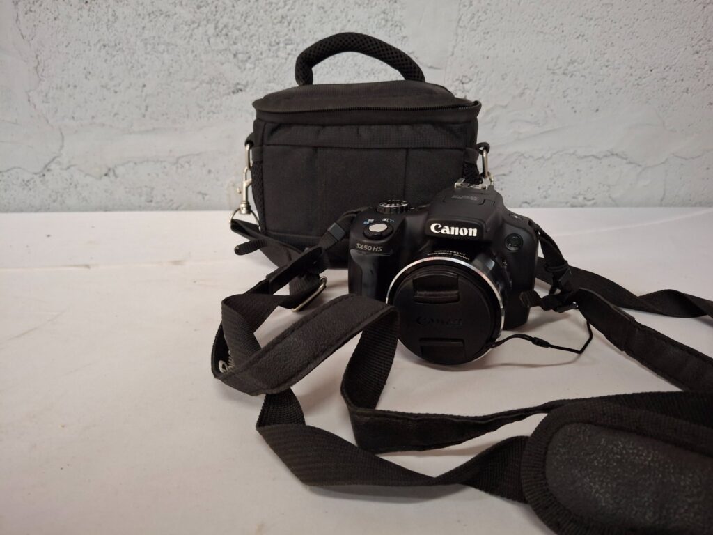 Canon PowerShot SX50 HS bridge camera (body) with soft padded case — NOT WORKING