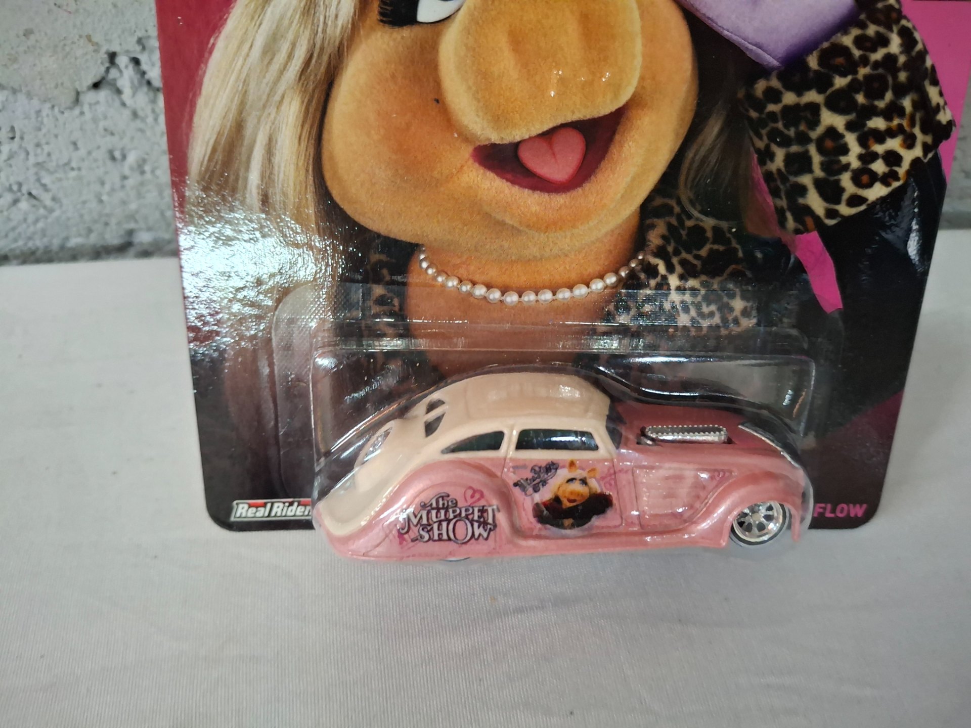 Hot Wheels The Muppet Show — Miss Piggy die-cast car (factory-sealed on card)