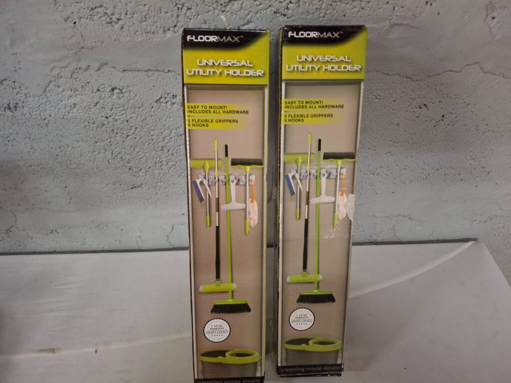 FLOORMAX Universal Utility Holder — 2 boxed sets + 1 loose multi-grip wall holder (boxes opened, hardware present)