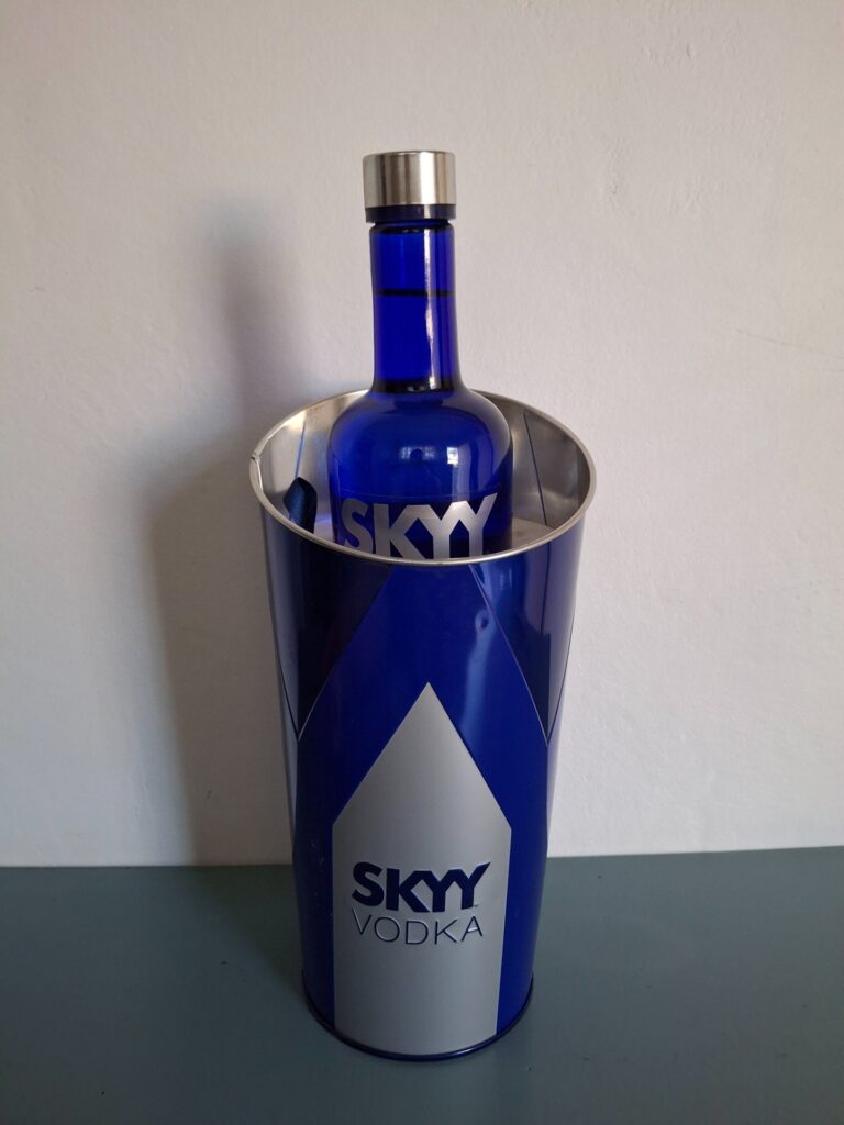 SKYY Vodka 750 ml — cobalt blue glass bottle in matching metal presentation tin (factory sealed)