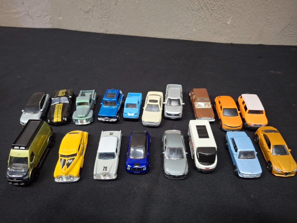 Bulk lot — 18 Hot Wheels / Mattel die-cast toy cars, mixed models, used playwear